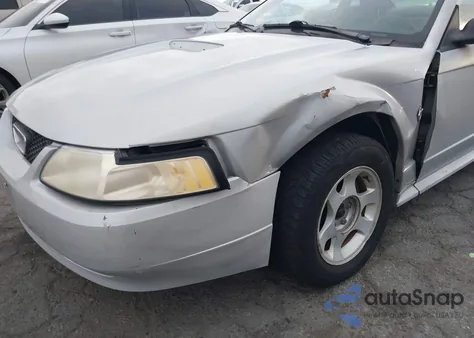 1999 Ford Mustang из США, поврежденный, VIN 1FAFP4041XF136988